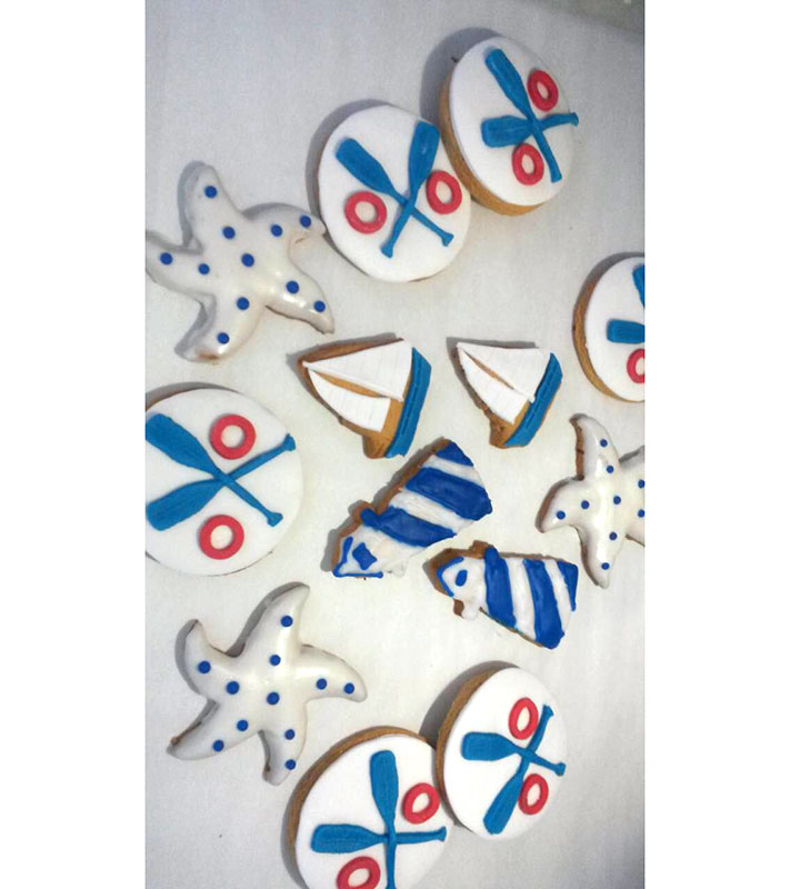 Biscuits in various shapes with sailing theme for baptism in Sifnos
