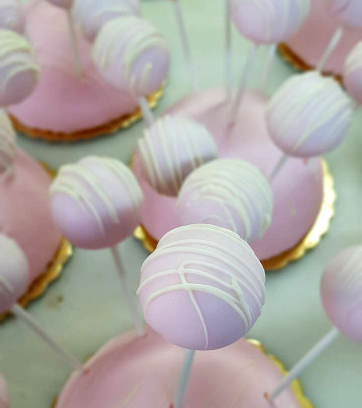 Pink lollipops for baptism in Sifnos