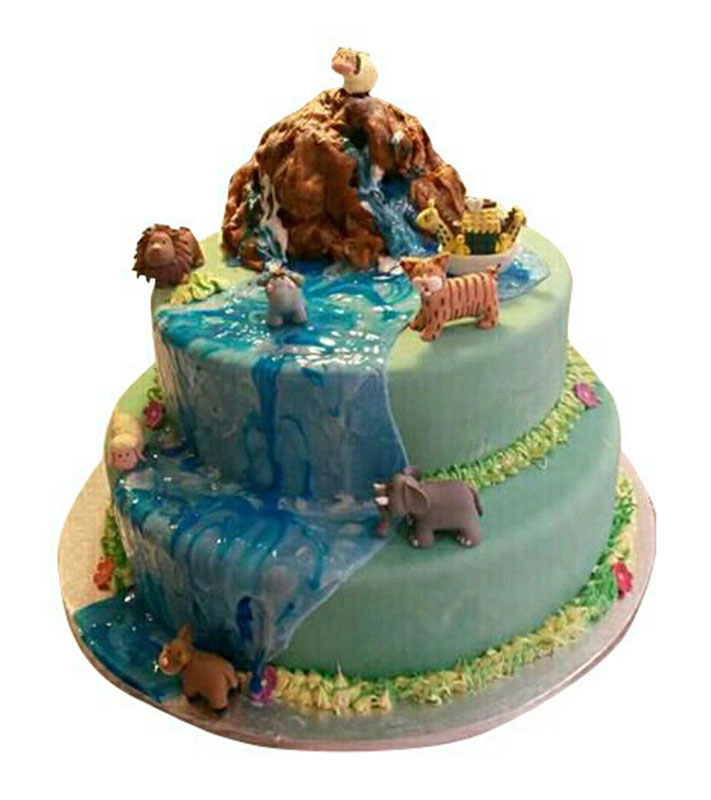 Multi layer birthday cake with jungle animals