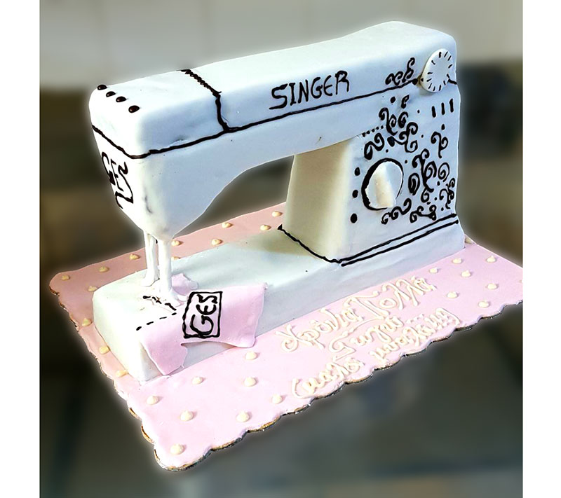 Birthday cake in the shape of a sewing machine