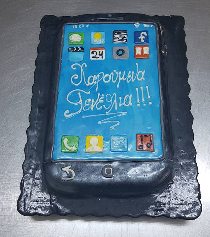 Cake with sugar paste in the shape of a mobile phone