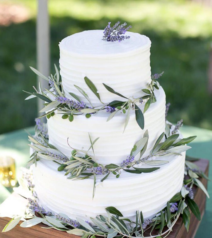 Romantic wedding cake with olives and lavenders